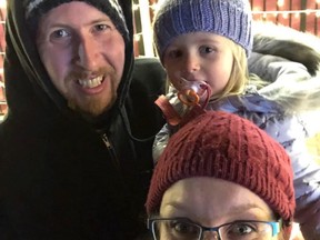 Dave McIntosh, left, and his wife Gill, bottom, are seen with their daughter in this undated photo. 
 Gill, 37, remains in the intensive care unit of the Abbotsford General Hospital, in an induced coma due to COVID-19.