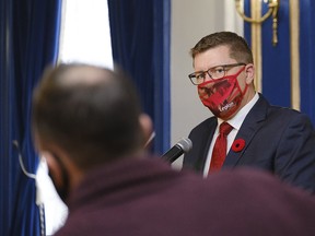 Premier Scott Moe speaks to media after the announcement of his new cabinet in Regina, Monday, Nov. 9, 2020. New measures take effect in Saskatchewan today to fight COVID-19, including a mask mandate.