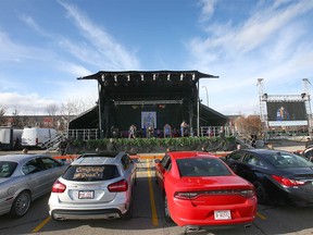 Cars are shown in the front row during an outdoor convocation drive-in style ceremony at Mount Royal University in Calgary on Wednesday, November 4, 2020.