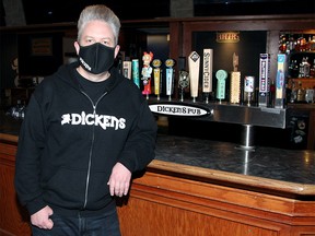 Chris Hewitt, owner of Dickens Pub, poses for a photo inside the bar. Hewitt has made the decision to temporarily close down Dickens Pub for the next two-to-three weeks as COVID-19 infections are on the raise in the Calgary zone. Tuesday, November 17, 2020.