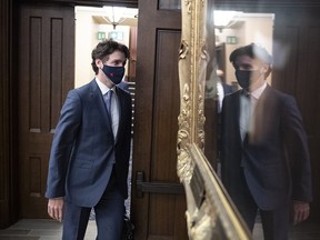 Prime Minister Justin Trudeau arrives for the tabling of a fiscal update in the House of Commons, in Ottawa, on Monday, Nov. 30, 2020.