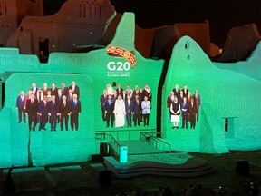 FILE PHOTO: Projection of a "Family Photo" for the annual G20 Leaders' Summit onto Salwa Palace in At-Turaif, one of Saudi Arabia's UNESCO World Heritage sites, in Diriyah, Saudi Arabia, November 20, 2020.