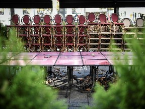 A terrace of a closed restaurant sits empty on the Champs-Elysees in Paris, during a second national lockdown in France aimed at curbing the spread of the COVID-19 pandemic. Will Alberta do the same thing? An infectious diseases specialist from the University of Alberta suggests we may need a short, sharp circuit-breaker lockdown for two to four weeks to stem rising infections.