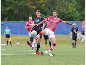 Canadian Premier League - Pacific FC  vs Cavalry FC - Charlottetown, PEI- Aug 30, 2020]. Cavalry FC #29 Marcus Haber reaches for the ball.