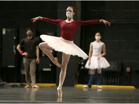 Jennifer Gibson rehearses at the Jubilee Auditorium as Yoshiya Sakurai and Mariko Kondo watch in the background. The performers are returning to the stage for the first time since the COVID-19 shutdown. Jim Wells/Postmedia