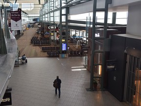 The Edmonton International Airport, normally a bustling hub of travellers and vehicles, is eerily quiet on April 25, 2020, with the severe drop in airline passengers.