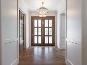 The custom front doors in the Mount Royal show home, by Veranda Estate Homes.