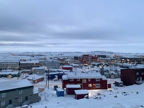 Iqaluit, Nunavut, is shown after 2 p.m. sunset on Nov. 24, 2020. The territory plans to start lifting a two-week lockdown due to COVID-19 spread on Wednesday.