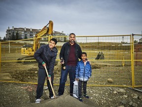 Nikesh Bhagat, with his two sons, bought a home by Hopewell Residential in Arbour Lake West.