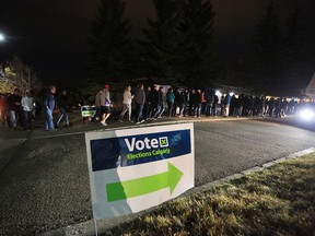 Ward 6 voters line up to cast their ballots in the Calgary municipal election on Oct. 16, 2017.