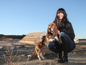 Priya Boyal and her trusted pooch Emmitt await the construction of their new home in Belmont.