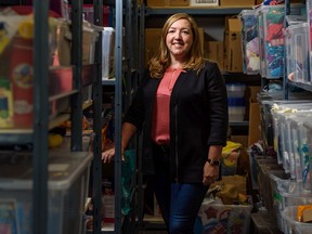 Made by Momma Director and President Allyson Palaschuk poses for a photo inside the organizationÕs birthday inventory on Monday, November 11, 2019. Azin Ghaffari/Postmedia Calgary