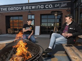 Chef Merritt Gordon, left, and Ben Leon, owner, pose for a photo at The Dandy Brewing Company on Thursday, December 3, 2020. Azin Ghaffari/Postmedia