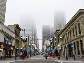 A nearly empty Stephen Avenue Mall in downtown Calgary on Friday, Dec. 11, 2020. Canada and Canadians face five must-tackle challenges in 2021, say writers.