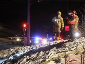 Emergency crews are at the scene of a serious vehicle accident near the intersection of 17th Ave and 85th St. SW. One vehicle flipped over into a nearby ditch. Saturday, December 12, 2020. Brendan Miller/Postmedia