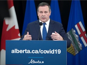 Premier Jason Kenney announces new pandemic restrictions at a news conference Nov. 24, 2020, in Edmonton. It was incredibly short-sighted to be such a critic of harsh restrictions and then turn around and impose them, writes columnist Rob Breakenridge.