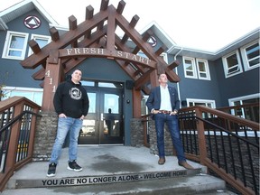 Rene Desjardins (L) a resident support worker and Stacey Petersen, Executive Director of Fresh Start Recovery Centre pose in front of the facility in northeast Calgary facility on Wednesday, November 25, 2020. Jim Wells/Postmedia