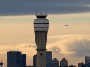 A business jet climbs out of Calgary International Airport on Tuesday, Dec. 15, 2020.