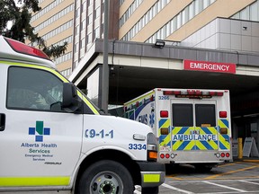 An ambulance is seen parked in the emergency entrance of the Foothills Medical Centre. Wednesday, Dec. 9, 2020.