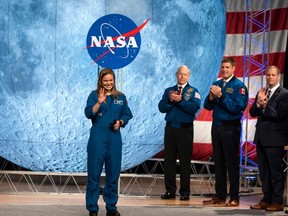 Canadian Space Agency (CSA) astronaut Jenni Sidey-Gibbons graduates at Johnson Space Center in Houston Texas, on January 10, 2020. - The 13 astronauts, 11 from NASA and 2 from CSA, are the first candidates to graduate under the Artemis program and will become eligible for spaceflight, including assignments to the International Space Station, Artemis missions to the Moon, and ultimately, missions to Mars, according to NASA. (Photo by Mark Felix / AFP)