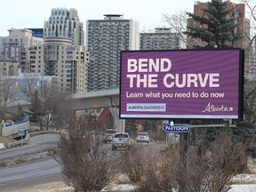 An electronic billboard displays Alberta COVID-19 information during the height of the pandemic on Dec. 17, 2020.