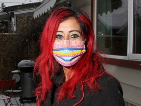 Nina Saini, executive director of the Punjabi Community Health Services, poses for a photo at her Bridgeland home.  Friday, December 11, 2020.