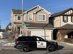 Police investigate a home in the 100 block of Brightonstone Bay S.E. after an infant was found dead there.