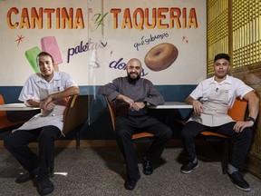 Sous Chef Robbie Brooks, left, Chef Salvador Penieres, and Sous Chef Emilio Montenegro pose for a photo at A1 Cantina on Thursday, January 21, 2021. Azin Ghaffari/Postmedia