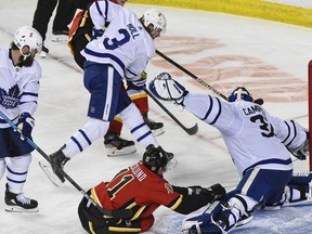 Calgary Flames Juuso Valimaki's shot is saved by Toronto Maple Leafs Goalie Jack Campbell during the third period in Saddledome on Sunday, January 24, 2021. Azin Ghaffari/Postmedia