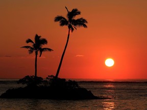 The sun rises in Honolulu.