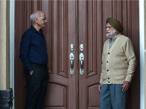 Living in a multi-generational home, Varinder Bhullar, left, worries about his father, Mohinder Bhullar, 90. He worries he or his children will bring the virus home, putting his father at risk.