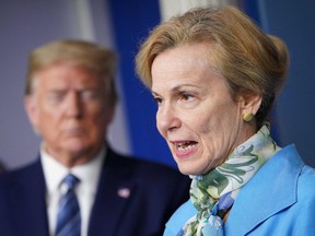 Response coordinator for White House Coronavirus Task Force Deborah Birx speaks as US President Donald Trump listens during the daily briefing on the novel coronavirus, COVID-19, in the Brady Briefing Room of the White House in Washington, DC on April 21, 2020.