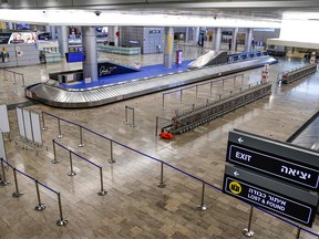 This picture taken on Jan. 24, 2021, shows a view of the empty baggage-claim area at the terminal of Israel's Ben-Gurion International Airport in Lod, near Tel Aviv.