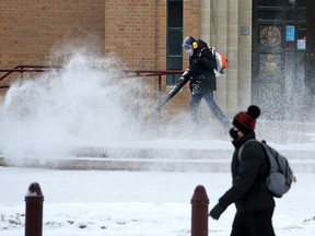 The overnight snowfall is cleared around St. Mary’s Cathedral in Calgary on Wednesday, January 27, 2021. Warmer temperatures are forecast towards the end of the week and the weekend.