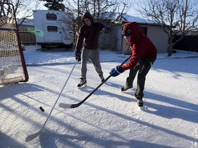 A liner will help keep the ice smooth in backyard rinks during the freeze/thaw cycle of Canadian winters.