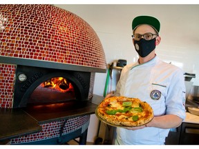 Pizza Culture owner and chef Jeremy Hube was photographed next to the restaurant's Italian wood fired oven on Thursday, January 7, 2021. 

Gavin Young/Postmedia
