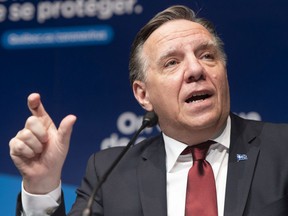 Quebec Premier François Legault speaks to the media at a COVID-19 press briefing Monday Jan. 11, 2021 in Montreal.