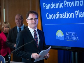 B.C. Health Minister Adrian Dix arrives for a news conference in Vancouver on March 6, 2020.