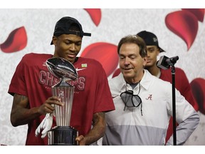 Alabama Crimson Tide wide receiver DeVonta Smith (6) and head coach Nick Saban celebrate the victory over the Notre Dame Fighting Irish following the Rose Bowl at AT&T Stadium. Photo by Kevin Jairaj/USA TODAY Sports