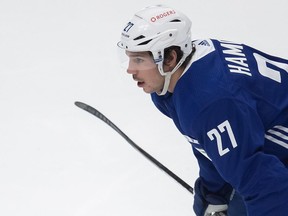 CP-Web.  Vancouver Canucks' Travis Hamonic pauses on the ice during the NHL hockey team's training camp in Vancouver, on Monday, January 11, 2021.