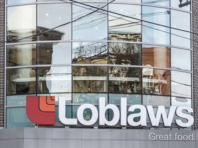 Loblaws company logo on a building in downtown Toronto.