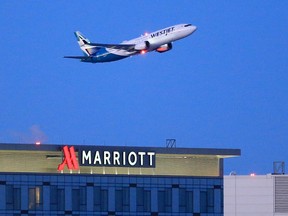 A WestJet 737 MAX 8 takes off in Calgary on Thursday, Jan. 21, 2021, marking the first commercial flight since the aircraft was grounded in 2019.