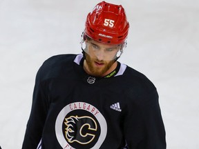 Calgary Flames Chris Tanev and Noah Hanifin during NHL hockey training camp at the Saddledome in Calgary on Saturday January 9, 2021. Al Charest / Postmedia