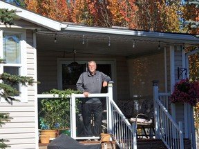 Paul Stoker on the deck of a park model home at Coyote Creek Golf and RV Resort.