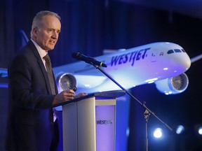 WestJet president and CEO Ed Sims addresses the airline's annual meeting in Calgary on May 7, 2019.