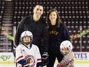 Calgary Flames assistant general manager Chris Snow with wife Kelsie Snow and their two children. 