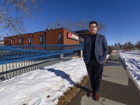 Jung-Suk Ryu, CEO of National accessArts Centre, poses for a photo outside accessArt's new location, Scouts Canada building, on Saturday, February 20, 2021. Azin Ghaffari/Postmedia