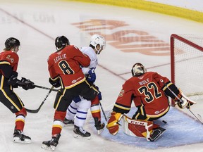 Toronto Marlies Richard Clune scores a goal against Stockton Heat Goalie Dustin Wolf at Scotiabank Saddledome on Sunday, February 21, 2021. Azin Ghaffari/Postmedia