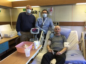 From left: Dr. Jeffrey Medin, Dr. Aneal Khan and study subject Darren Bidulka during clinical trials at Foothills Medical Centre in 2017.