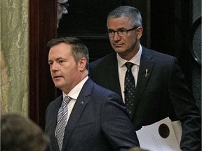 Jason Kenney, left, with Finance Minister Travis Toews.